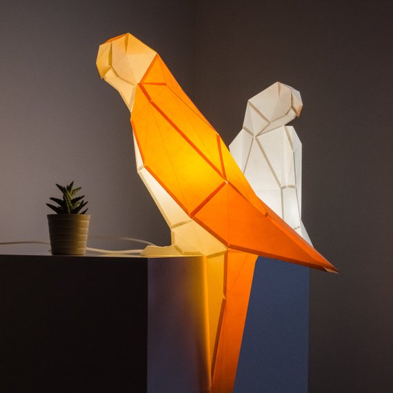 A couple of geometric parrots will fill your space with light and look catchy