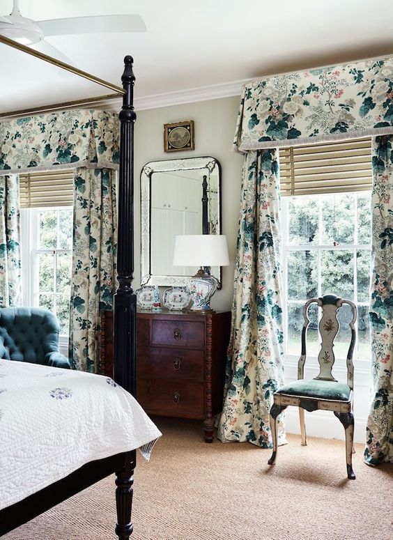 bold floral curtains add pattern to the bedroom, not only texture, they become a bold accent