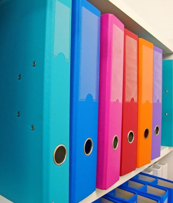 colorful binders can replace the old filing cabinet system making organizing papers much more comfortable