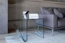 08 such a curved glass table will add a sophisticated yet modernized feel to the space
