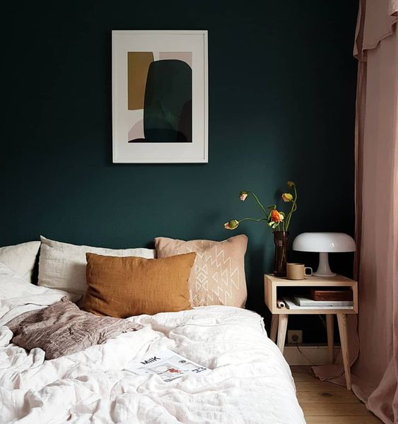 infuse your bedroom with a calming shade like dark green and you'll get a relaxed feel at once