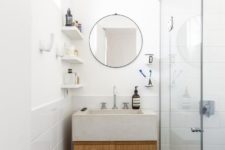 10 The bathroom is also neutral, with a white concrete sink, it’s very compact and comfy