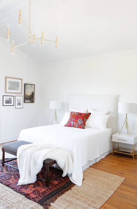 layered rugs, catchy chandeliers and lamps and an airy feeling will make your bedroom perfect