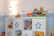 11 a kid’s sideboard with Drona boxes marked with pretty stars is a cute idea