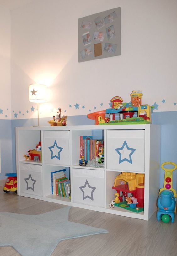 a kid's sideboard with Drona boxes marked with pretty stars is a cute idea