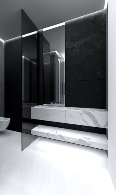 a smoked glass toilet door divides the zones in your bathroom gently, subtly, yet stylishly and edgy