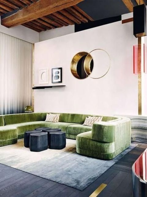 this green sofa makes a statement not only with texture but also with its color and unique shape