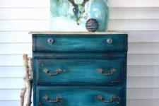 13 an old sideboard renovated with teal with a gradient effect is really worth crafting