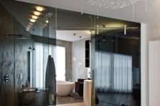 13 separate the en-suite bathroom from your bedroom with smoked glass doors to keep both spaces light-filled and connected