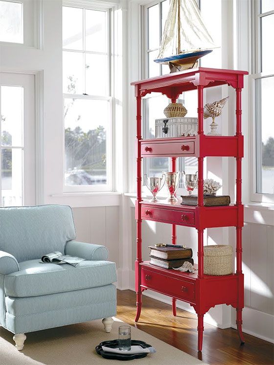 a bright etagere made up of several simple console tables is a cool furniture idea