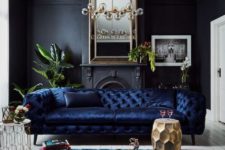 14 a fantastic and refined navy tufted velvet sofa adds a moody feel  and texture to the room
