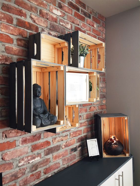 a simple rustic storage wall unit made of Knagglig boxes attached to each other is a very fast DIY