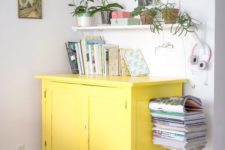 15 a sunny yellow sideboard will make a colorful statement in a neutral or monochromatic space giving it a mood