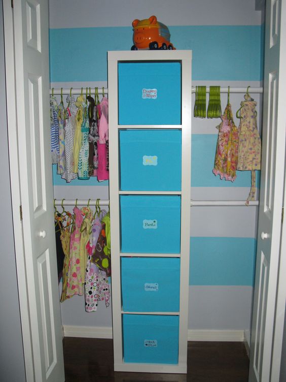 an IKEA Expedit shelf with Drona boxes and labels is a great option for a kid's closet