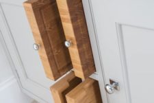 17 store your cutting boards inside a cabinet making just some holes for them