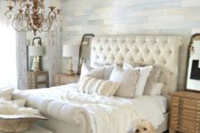 18 a neutral space with a neutral rug and a fringed blanket and fur pillows