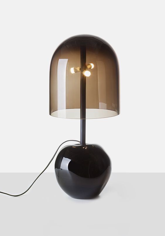 a stylish and bold modern table lamp with a black glass base and a smoked glass lampshade for a contemporary space