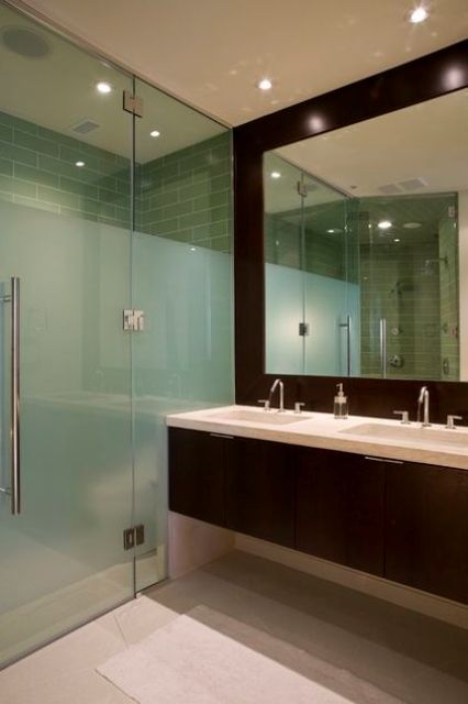 separate the shower space from the rest of the space, with frosted glass and usual glass for a catchy look