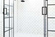 20 white subway tiles with black grout on the walls make up a cool combo with black and white mosaic tiles on the floor