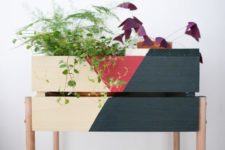 21 a color block Knagglig box placed on wooden legs can become a cool plant stand