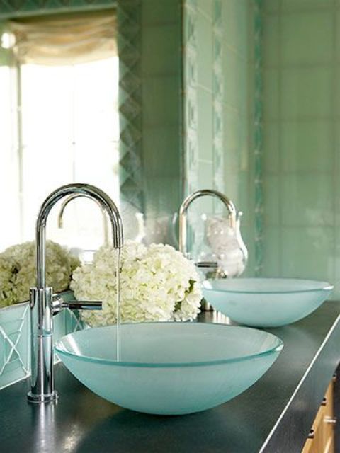 a duo of blue frosted bowl sinks is a cool and fresh take on traditional round sinks