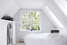 21 an airy space with a bed and a large built-in storage unit is a very realxing idea