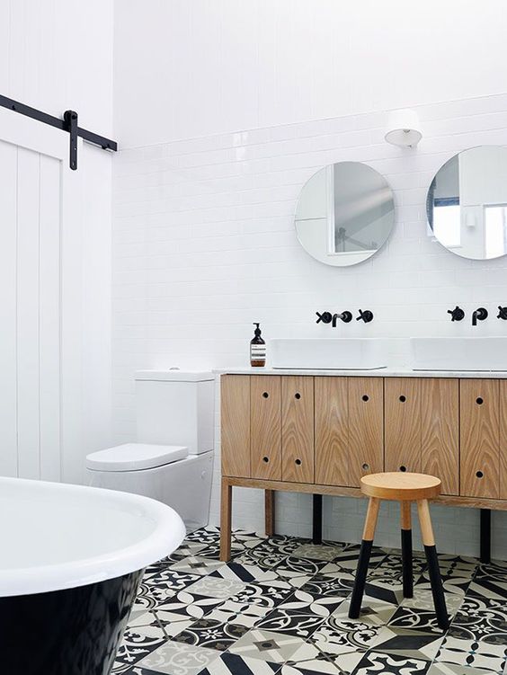 white tiles on the floors for making up a neutral space and black and white mosaic tiles on the floor for a statement