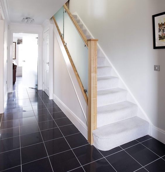 a frosted glass staircase looks very modern and bold and adds a touch of edge to your space