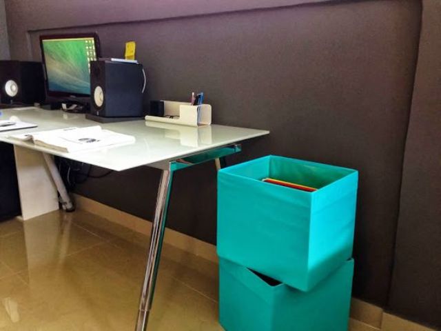 colorful Drona boxes can be placed next to the desk to use them for file storage or your filing system