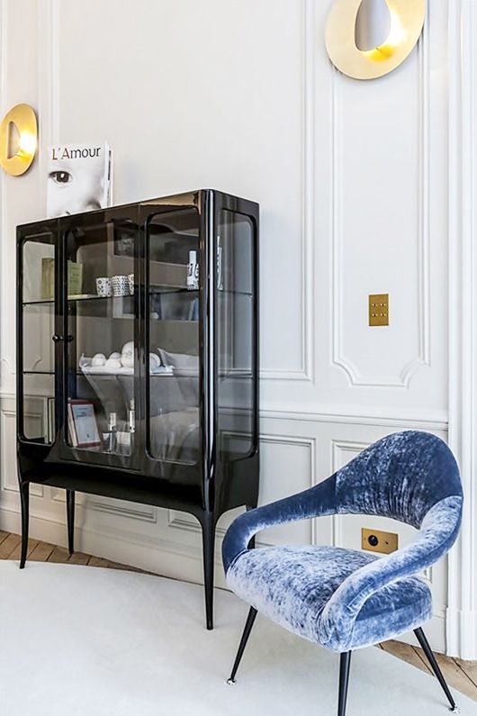 such a smoked glass cabinet is a fresh and modern take on a refined vintage furniture piece