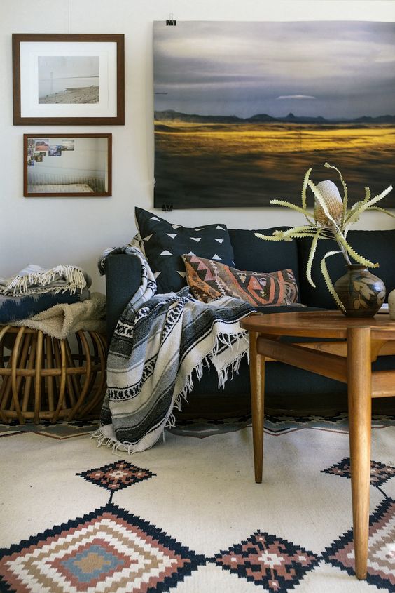 tribal textiles and rugs are amazing for sprucing up a neutral living room