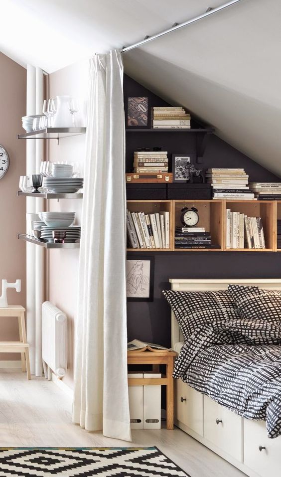 floating and box shelves over the bed and storage drawers in the bed