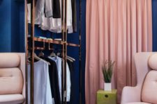 26 a navy closet with pink drapes and neutral furniture plus metallic touches looks very glam-like