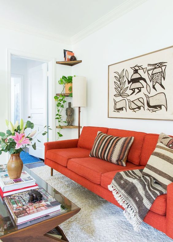 spruce up a bold sofa with tribal patterns to make it look creative and bold
