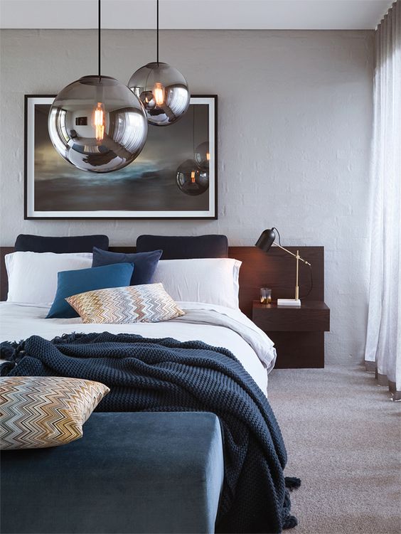 such gorgeous smoked bulb pendant lamps over your bed will make a cool statement