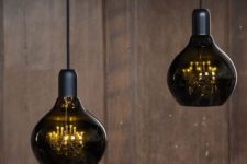 27 unique pendant lamps of smoked glass and with vintage refined chandeliers inside will be a conversation starter in your space
