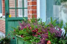 02 an English farmhouse style emerald window box with berries, fruits and flowers wows at once