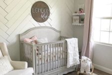 03 a statement wall clad with whitewashed wood is a great idea for a neutral or pastel nursery