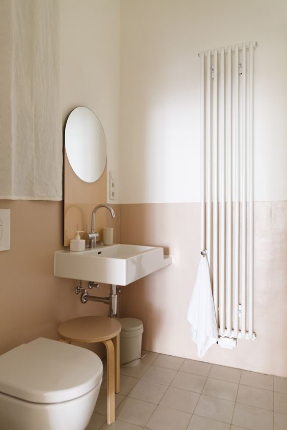 color blocking in the bathroom is a good idea, blush and white is a chic and soothing way to go
