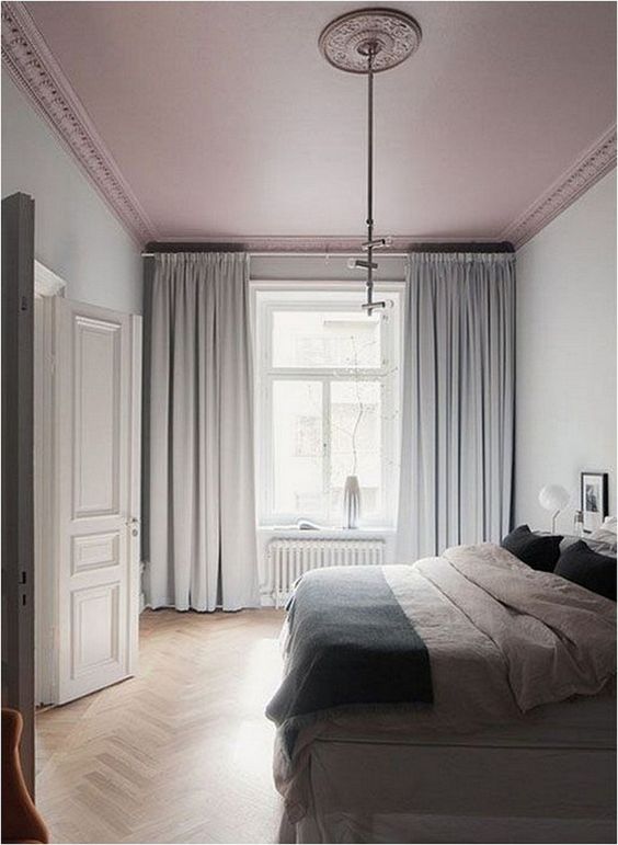 If your space is so neutral, a dusty rose ceiling can be a bold pastel statement that doesn't break the color scheme