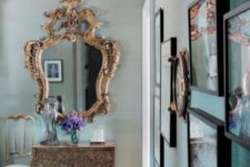 05 a chic aqua entryway done with a gold ceiling and a vintage frame mirror plus a unique vanity