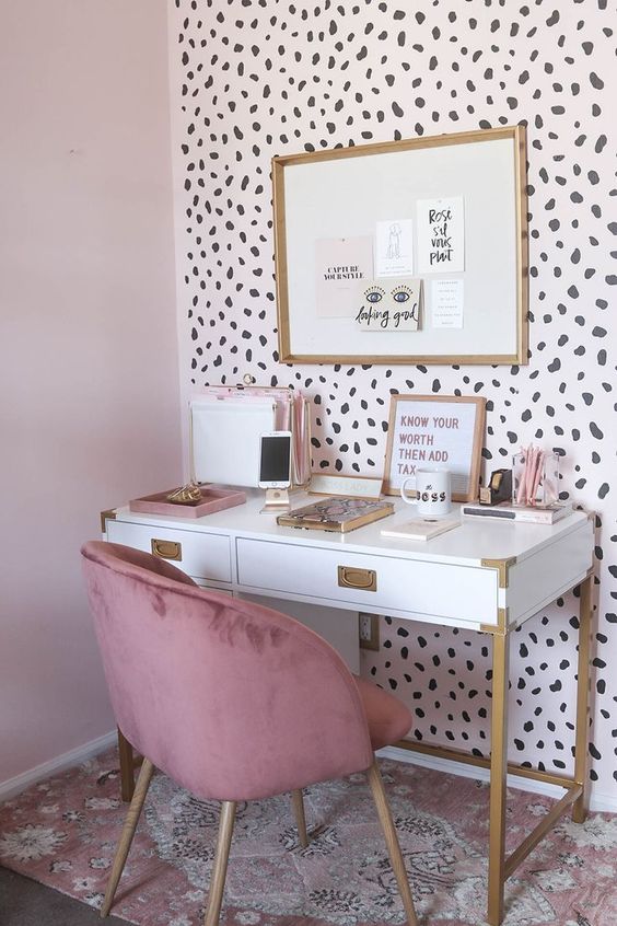 A statement wall done with cheetah wallpaper is a gorgeous and playful idea for a girlish space