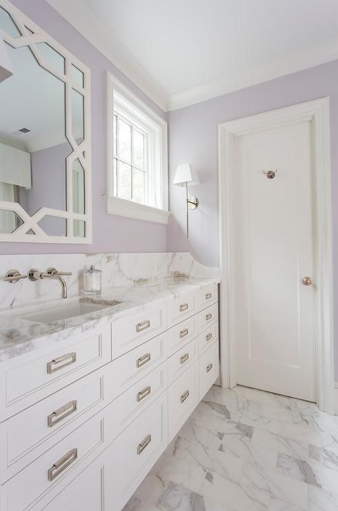 a white and lavender bathroom is a soft and calming space with a slight vintage feel