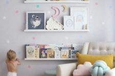 05 spruce up a wall with colorful decals that match the nursery’s accessories in color