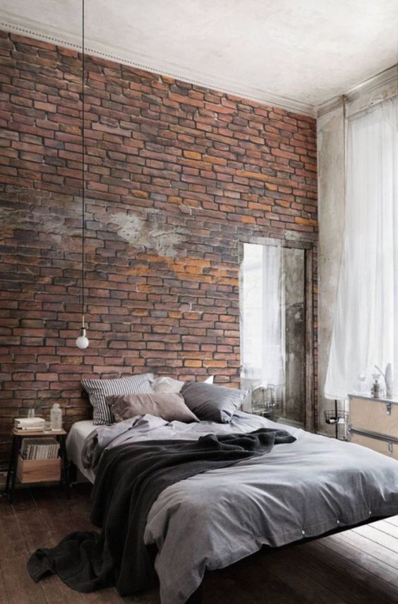 a gorgeous brick statement wall is an amazing idea for a masculine or an industrial bedroom