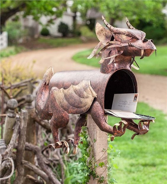 A metal dragon mailbox is a gorgeous idea for geeks, fantasty fans and many others   it won't be unnoticed