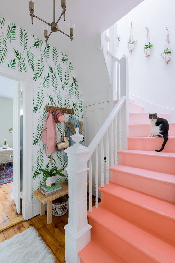 botanical prints never go out of style, and an ombre coral staircase features the color of 2019