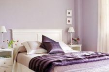 07 a feminine bedroom with lilac walls, purple accessories and an upholstered bench is a chic and refined idea