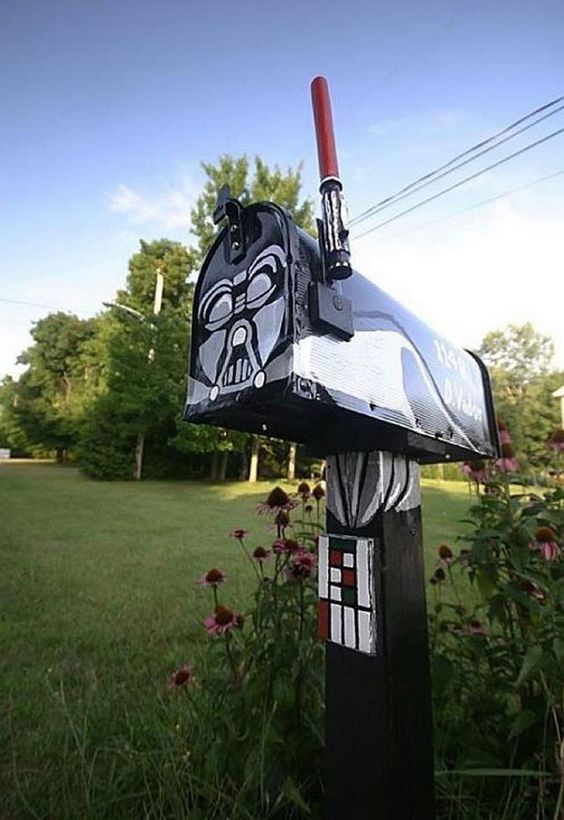 Darth Vader-inspired mailbox with a lightsaber is a fantastic mailbox idea for a geek - so enjoyable