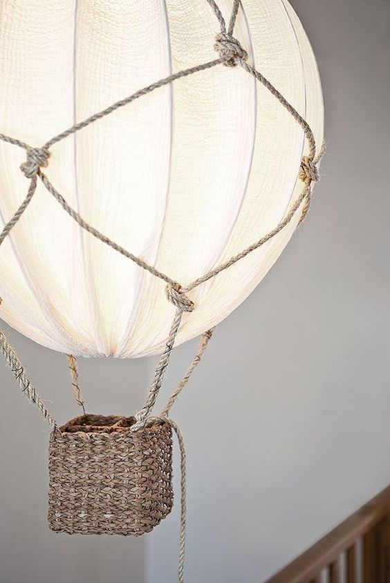a beautiful hot air balloon lamp using rope and an IKEA Regolit lampshade is a gorgeous and dreamy DIY